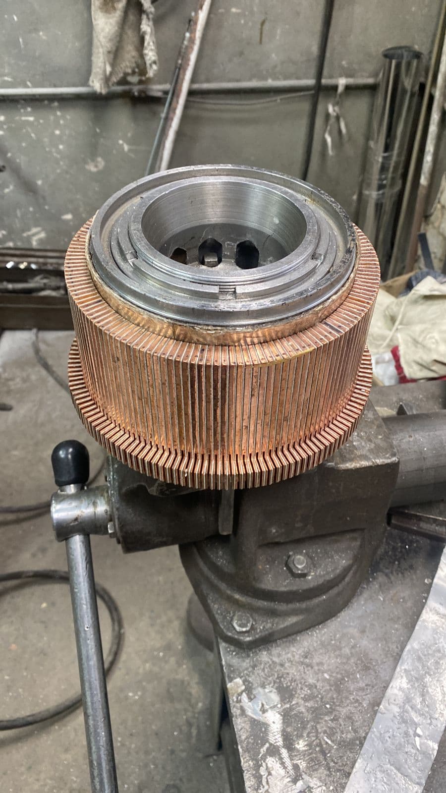Commutator of a DC machine being manufactured