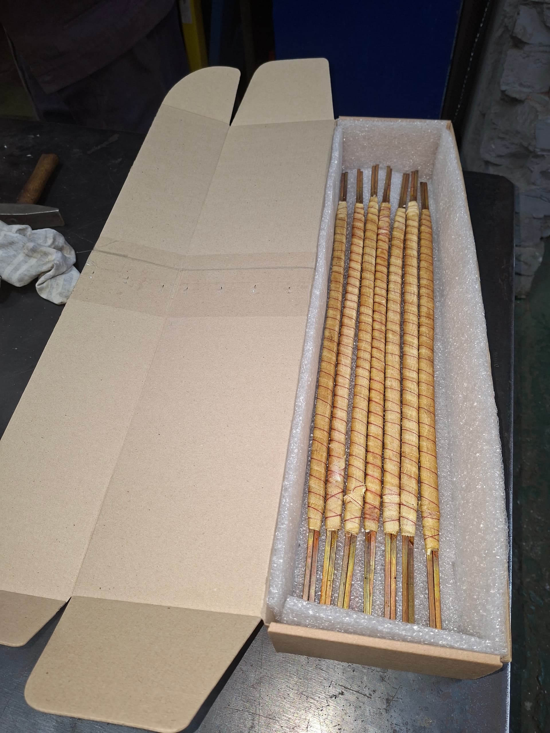 Insulated winding rods packed for despatch