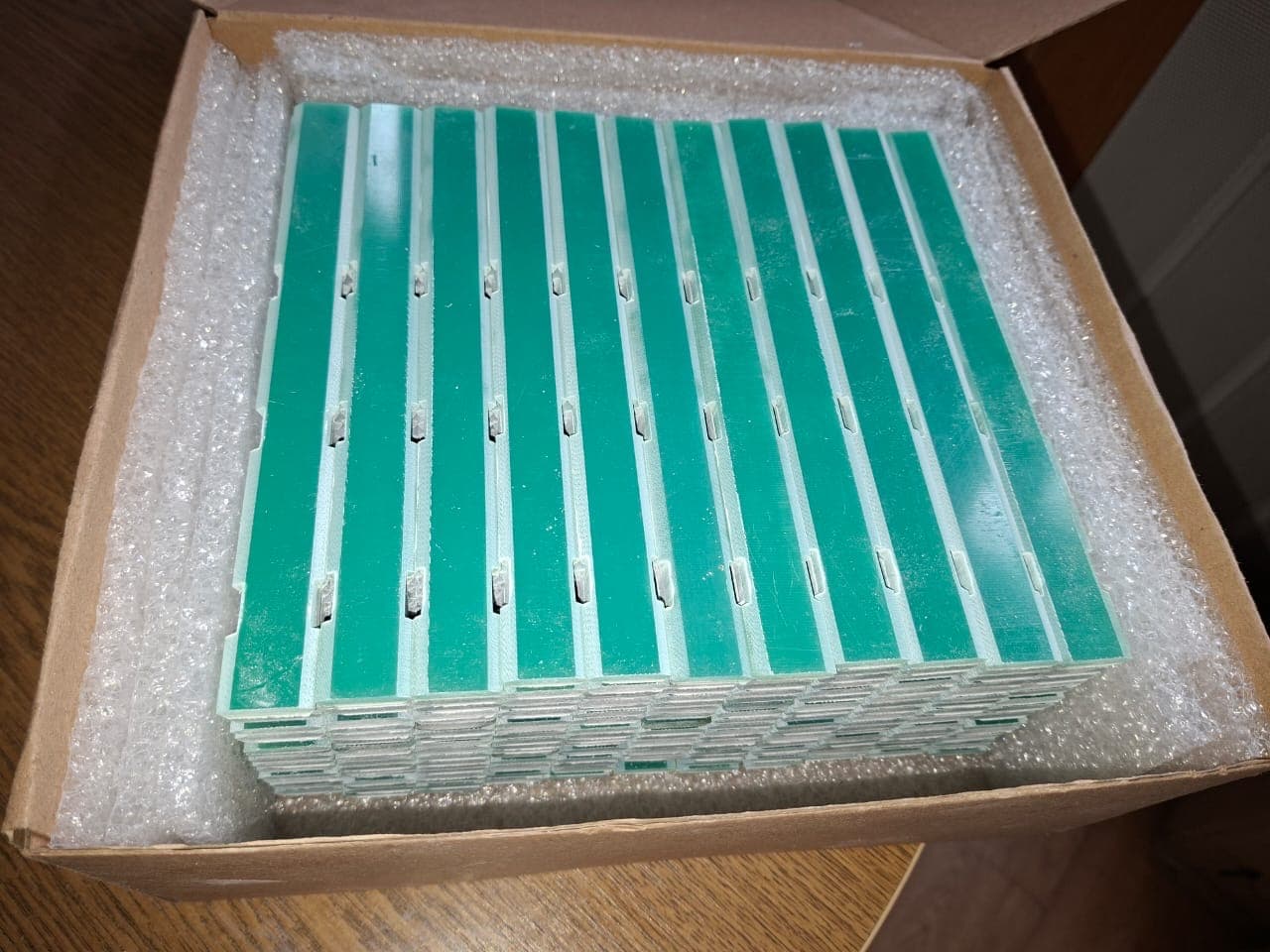 Slot wedges being manufactured